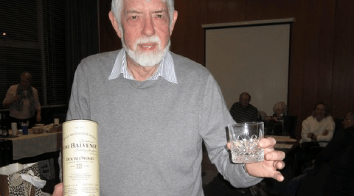 Andy was happy to pose for this photo with his gift of a bottle of 12 year old Balvenie whisky and a crystal 'guid size dram' glass.
